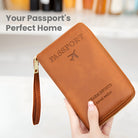 Brown RFID travel passport holder with wrist strap, embossed with "Passport" and airplane icon. Ideal for secure travel document storage.