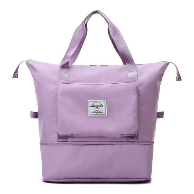 Stylish lavender tote bag with front pocket and dual handles, perfect for travel or daily use. Durable, spacious, and trendy accessory for women.