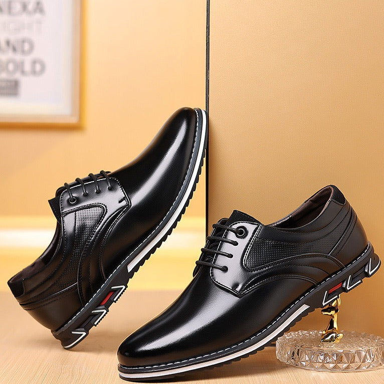 Sleek black leather dress shoes with unique sole design, perfect for formal occasions. Men's fashion footwear, stylish and comfortable.