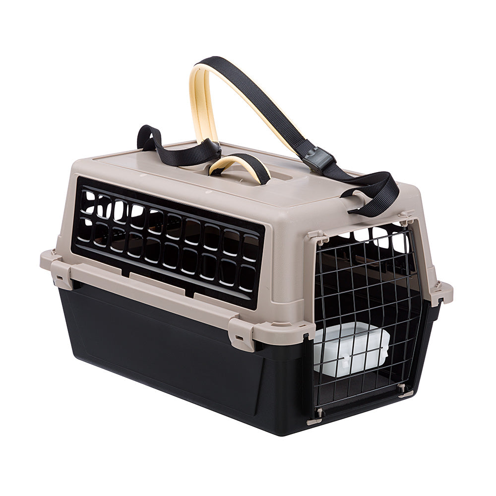 Pet travel carrier with secure latch, ventilation windows, and carrying handle. Ideal for small pets. Durable plastic design for safe transport.