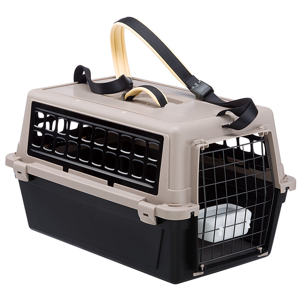 Pet carrier with durable plastic construction, secure metal door, and comfortable handle. Ideal for safe pet travel and transport.