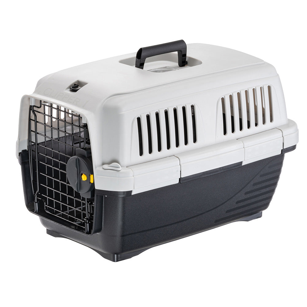 Pet travel carrier with secure latch, durable plastic construction, ventilation slots, and top handle. Ideal for safe transport of cats and small dogs.