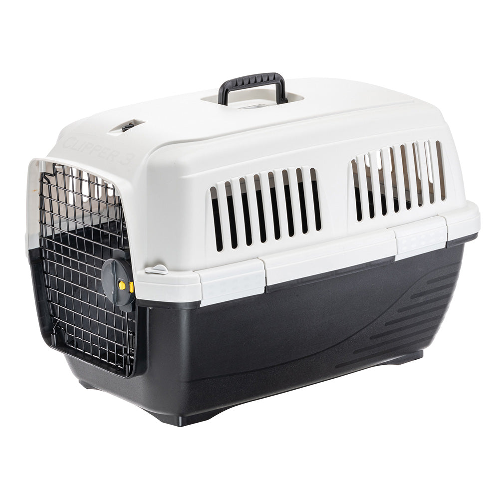 Pet travel carrier with secure latch, durable plastic construction, ventilation slots, and top handle. Ideal for safe transport of cats and small dogs.