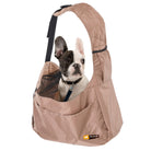 French Bulldog in a brown Ferplast pet carrier sling bag, featuring a mesh window and adjustable strap, ideal for small dog travel and comfort.