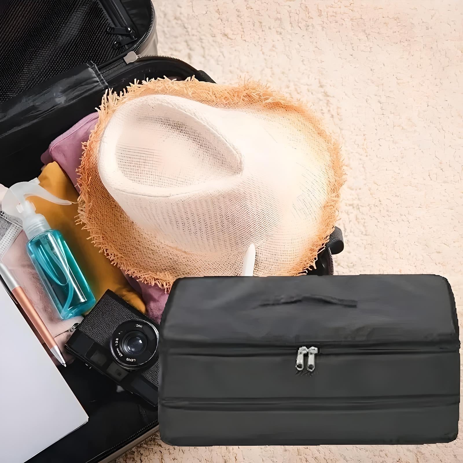 Open suitcase with a sun hat, camera, clothes, and toiletries on a beige carpet. Travel essentials, packing, vacation preparation, luggage organization.