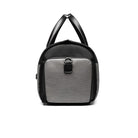 Sleek black and gray backpack with front pocket, modern design, durable straps, ideal for travel and daily use. Stylish, functional, versatile bag.