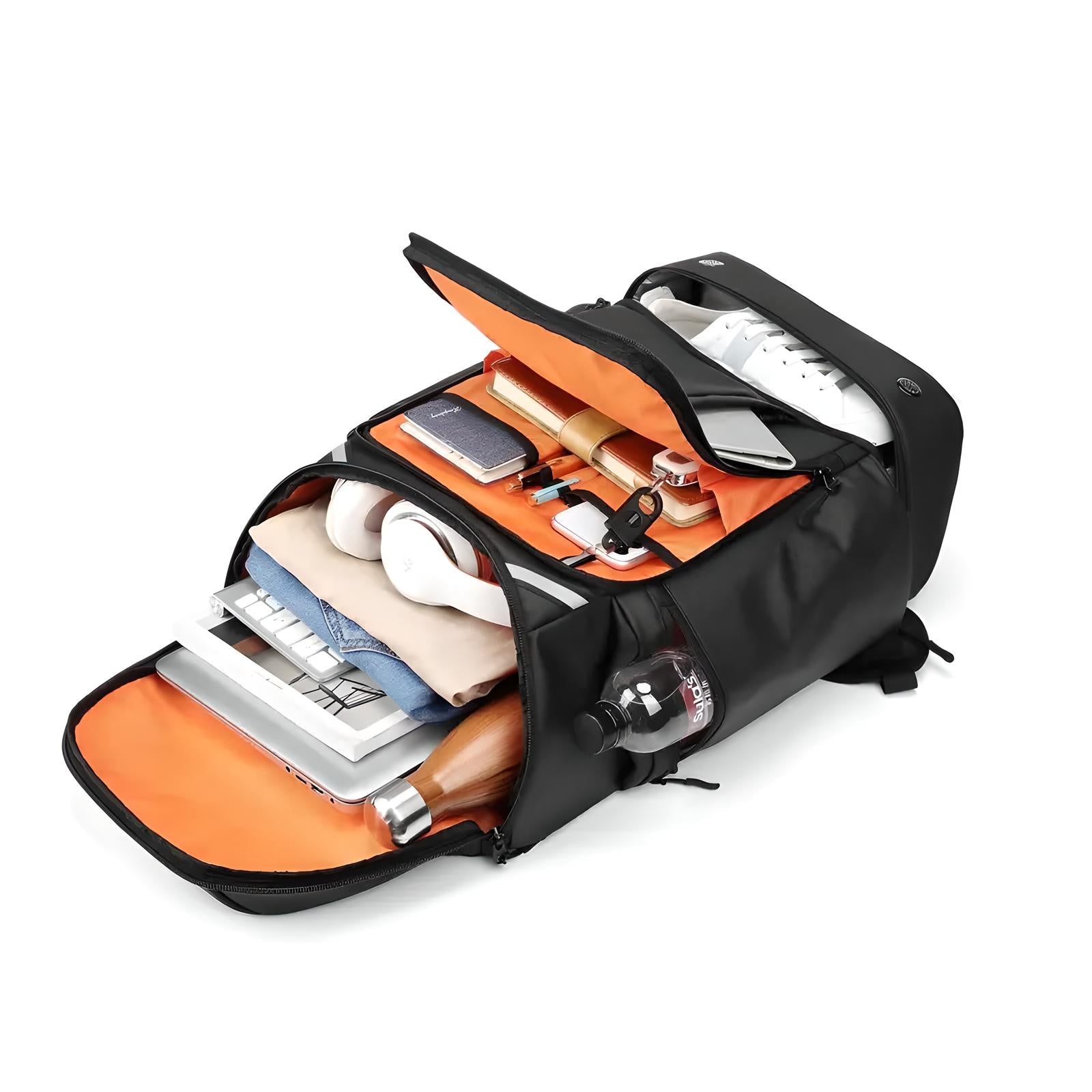 Open black travel backpack with orange interior, showcasing organized compartments holding a laptop, headphones, clothes, and water bottle.