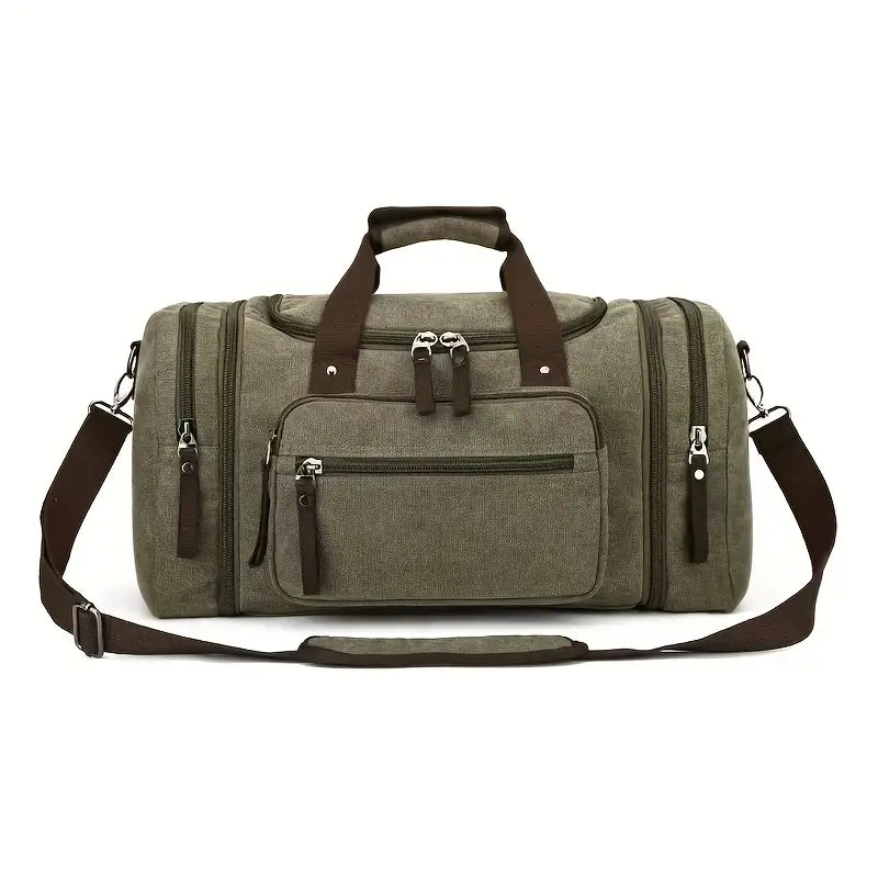 Olive green canvas duffel bag with brown straps, multiple zippered compartments, and adjustable shoulder strap. Ideal for travel, gym, or weekend trips.