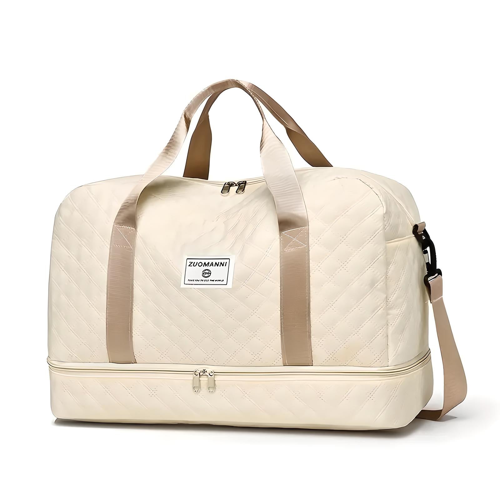 Beige quilted travel duffel bag with dual handles, adjustable shoulder strap, and front logo patch. Ideal for weekend trips and carry-on luggage.