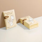 Flushable toilet seat covers in beige packaging, featuring a toilet illustration. Convenient, hygienic, travel-friendly; pack of 10 pieces.