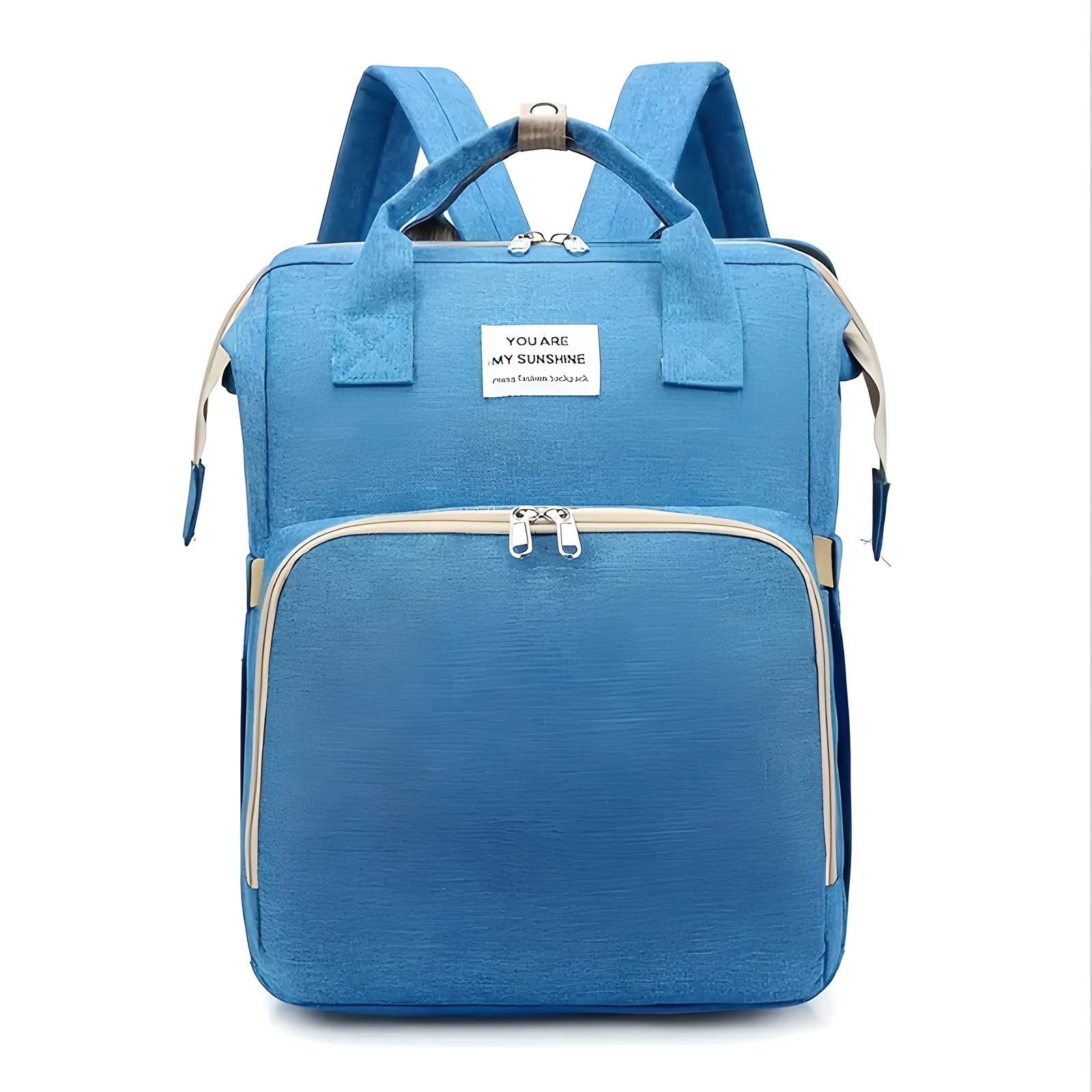 Blue backpack with front zipper pocket, top handles, and adjustable straps. Features "You Are My Sunshine" patch. Ideal for travel, school, or work.