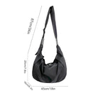 Black crossbody sling bag with adjustable strap, lightweight design, and spacious interior. Ideal for travel and daily use. Dimensions: 87cm x 45cm.