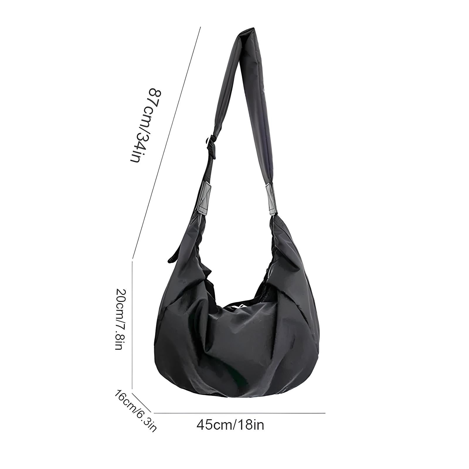 Black crossbody sling bag with adjustable strap, lightweight design, and spacious interior. Ideal for travel and daily use. Dimensions: 87cm x 45cm.