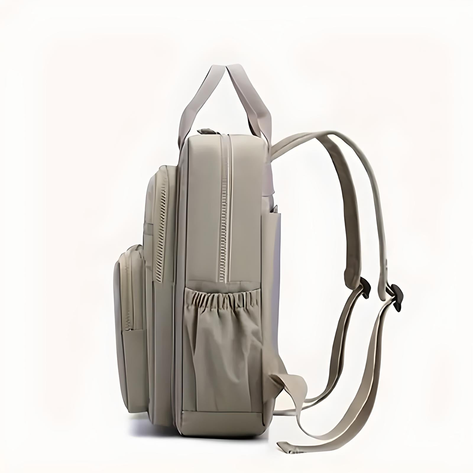 Sleek beige backpack with multiple compartments, ergonomic straps, and side pockets. Ideal for travel, school, or work. Durable and stylish design.