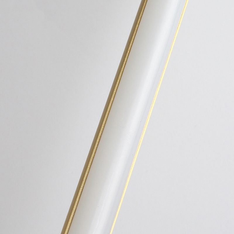 Minimalist gold and white LED light fixture, sleek modern design, energy-efficient lighting solution, ideal for contemporary home decor.