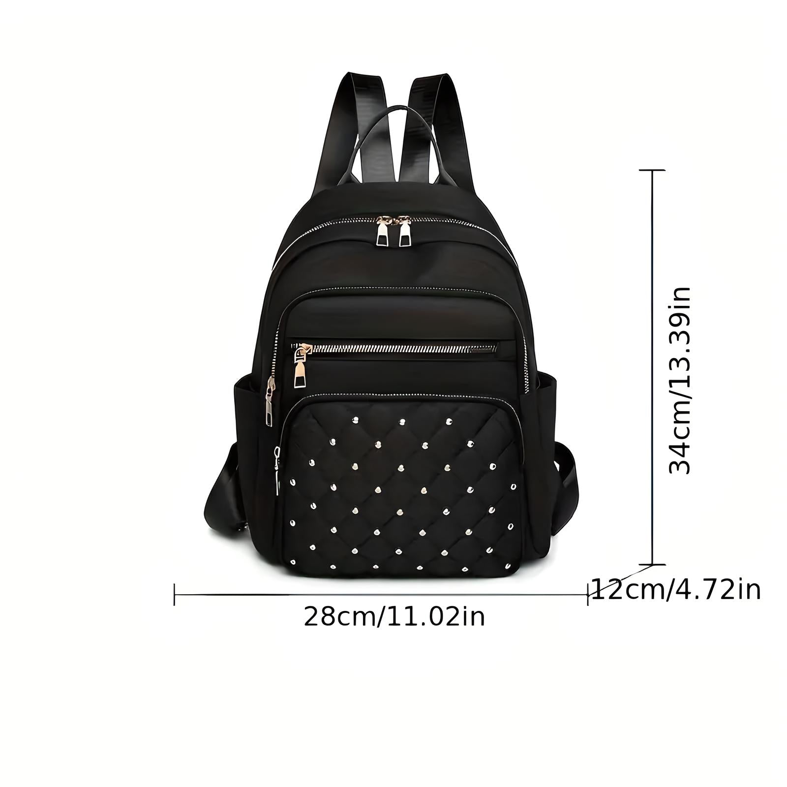 Black leather backpack with studded front pocket, multiple zippers, and adjustable straps. Dimensions: 34cm x 28cm x 12cm. Stylish and functional design.