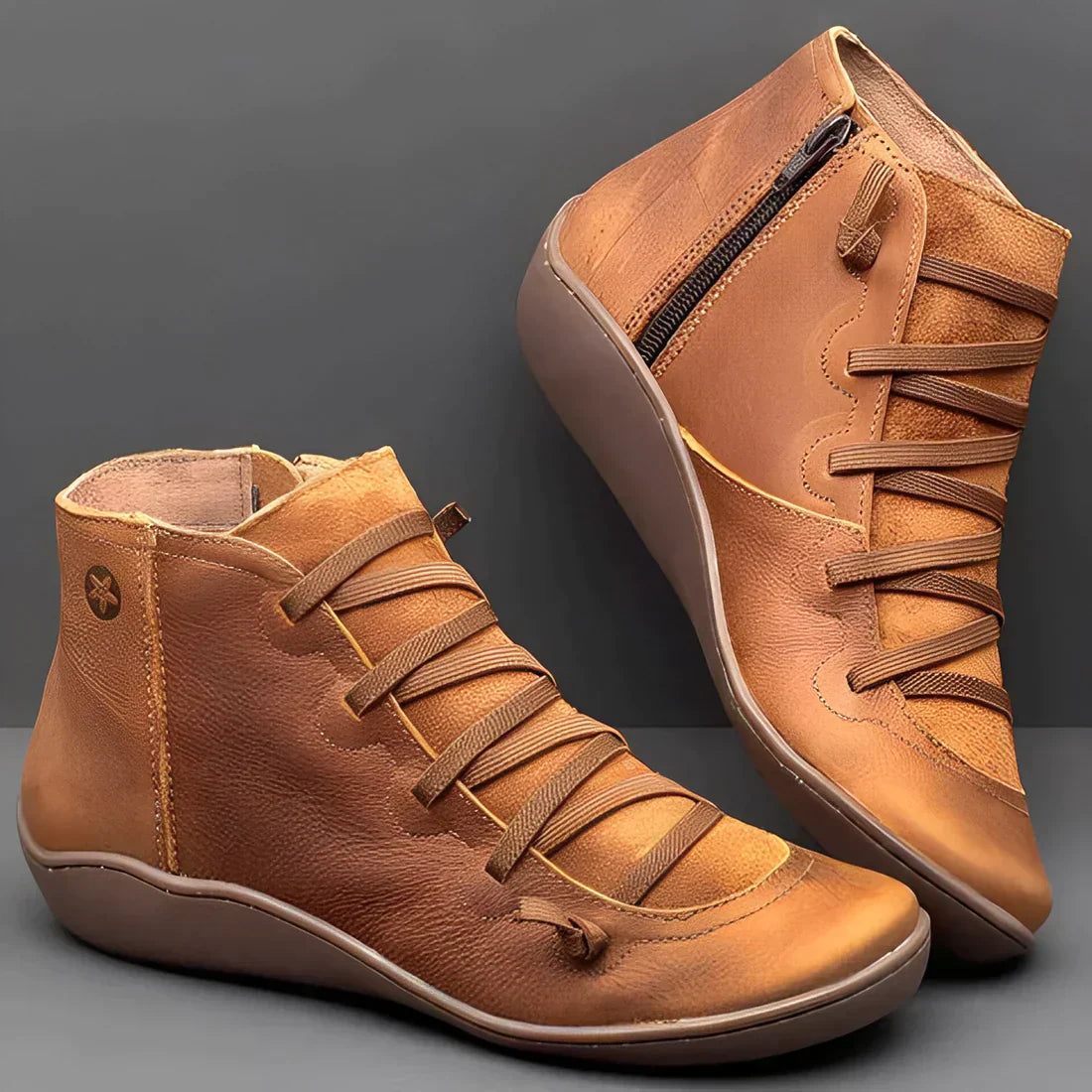 Brown leather high-top sneakers with side zipper and lace-up design, featuring a comfortable rubber sole. Stylish casual footwear for men and women.