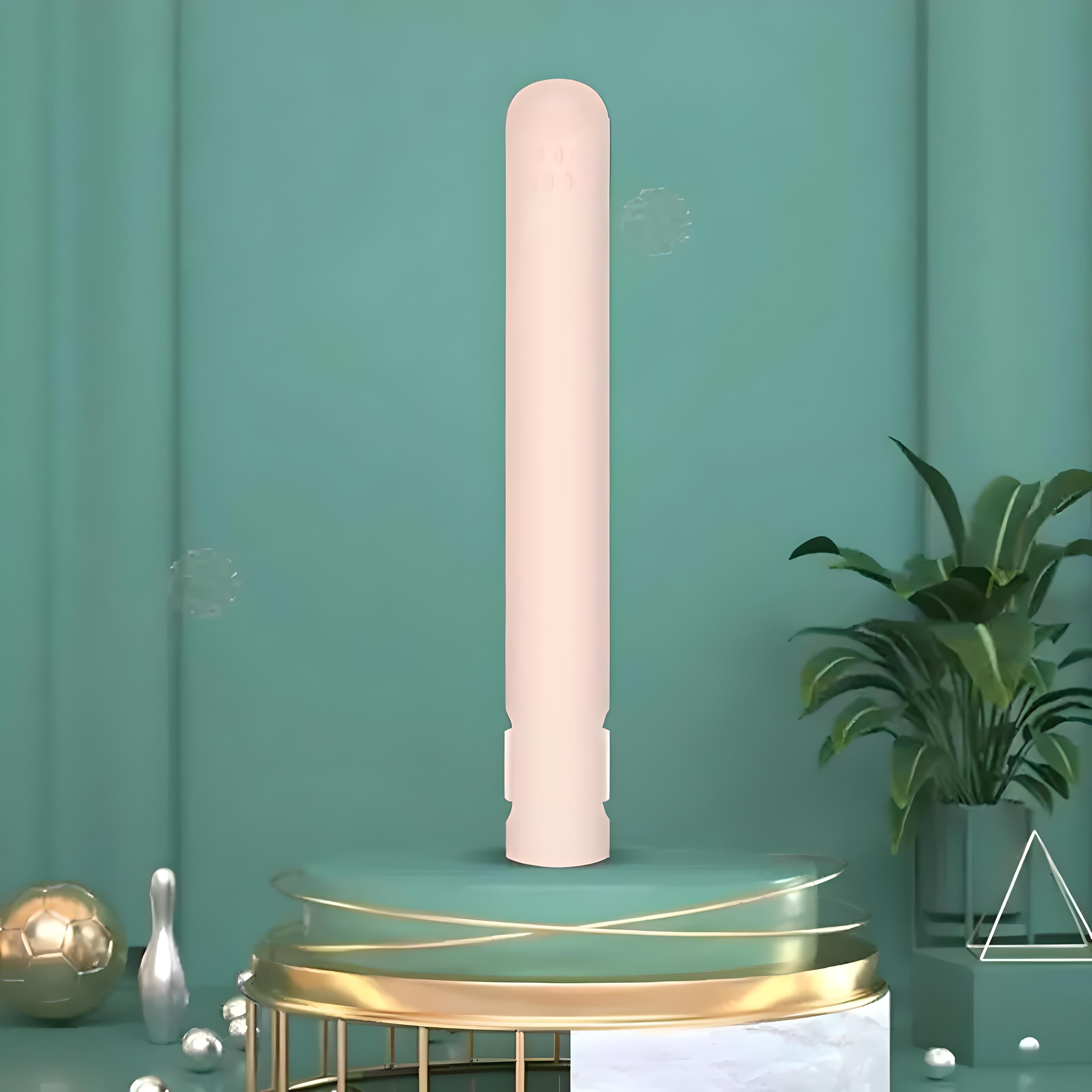 Sleek beige cylindrical air purifier on a modern green background with decorative plants and geometric accents, enhancing home air quality.