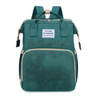 Green backpack with "You Are My Sunshine" label, featuring a large front pocket, adjustable straps, and durable fabric. Ideal for travel and school use.