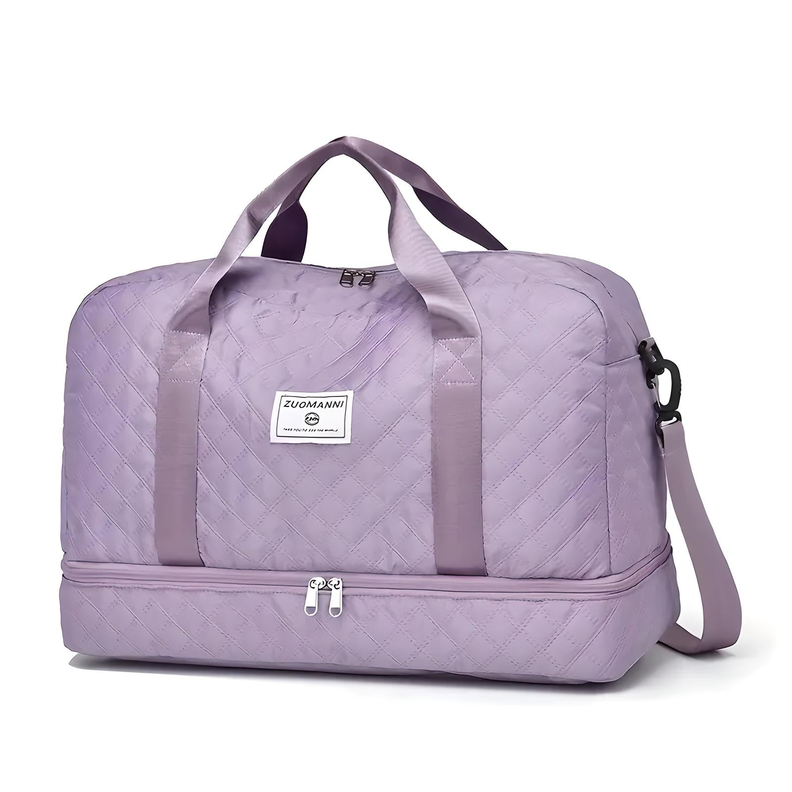 Quilted lavender travel duffel bag with dual handles, detachable shoulder strap, and front zipper pocket. Ideal for weekend trips and gym use.