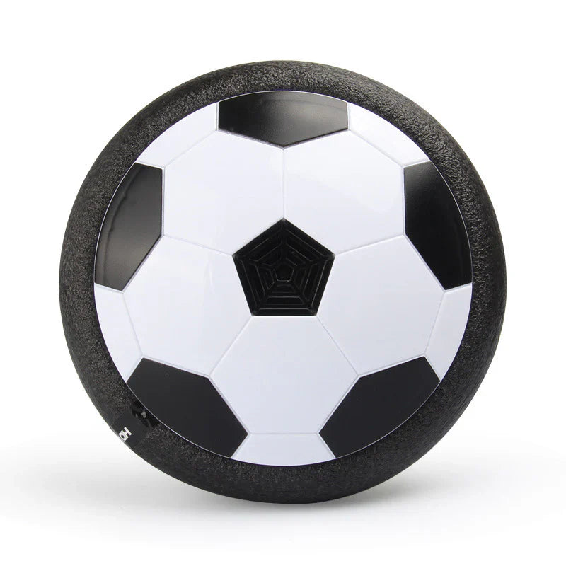 Black and white hover soccer ball toy with hexagonal pattern, designed for indoor play on smooth surfaces. Ideal for kids' active entertainment.