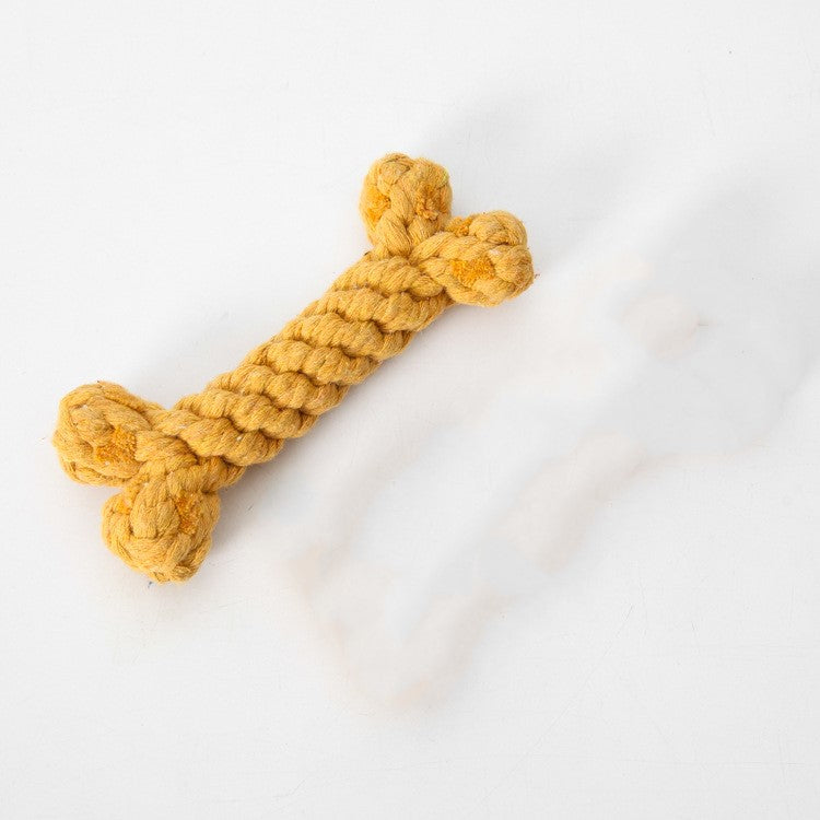 Yellow braided rope dog toy shaped like a bone on a white background, durable pet chew toy, ideal for small to medium dogs, eco-friendly material.