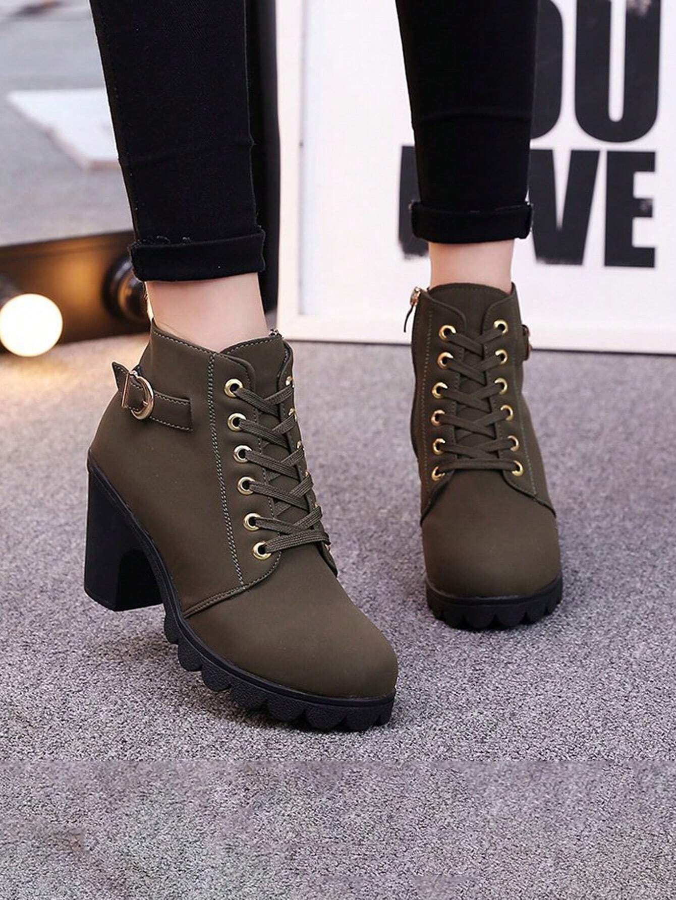 Olive green lace-up ankle boots with chunky heels and buckle detail, perfect for casual wear. Stylish women's footwear for fall fashion trends.