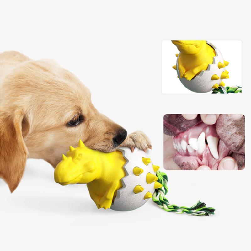 Puppy chewing on a yellow dinosaur-shaped dog toy with rope, designed for dental health and teething. Ideal pet chew toy for puppies and small dogs.