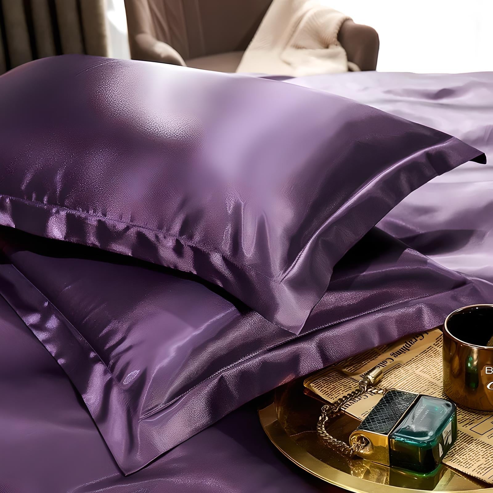 Luxurious purple silk pillowcases on a bed, showcasing smooth texture and elegant sheen. Perfect for enhancing bedroom decor and promoting restful sleep.