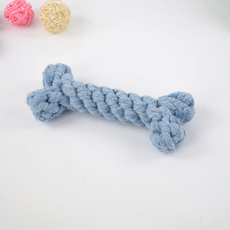 Blue cotton rope dog toy shaped like a bone on a white background, ideal for pet chewing and play. Durable pet accessory for dogs.