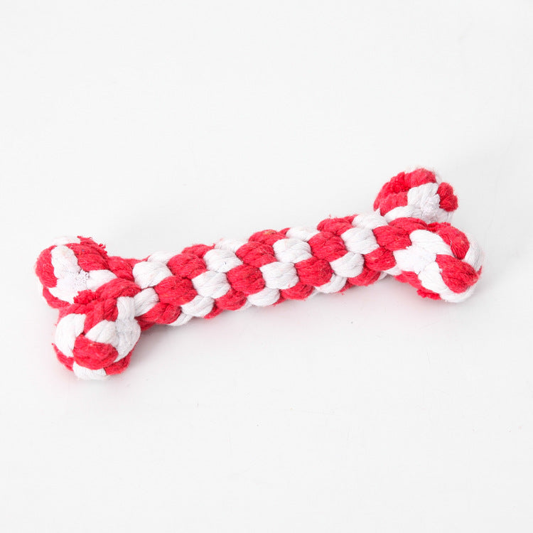 Red and white braided rope dog toy shaped like a bone, ideal for chewing and interactive play. Durable pet accessory for small to medium dogs.