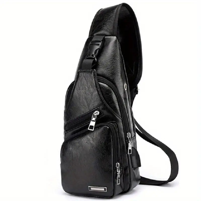 Sleek black leather crossbody sling bag with multiple zippered compartments, adjustable strap, and modern design. Perfect for travel and daily use.