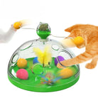 Interactive cat toy with transparent dome, colorful balls, and feathers. Engages cats in play. Perfect for pet entertainment and exercise.