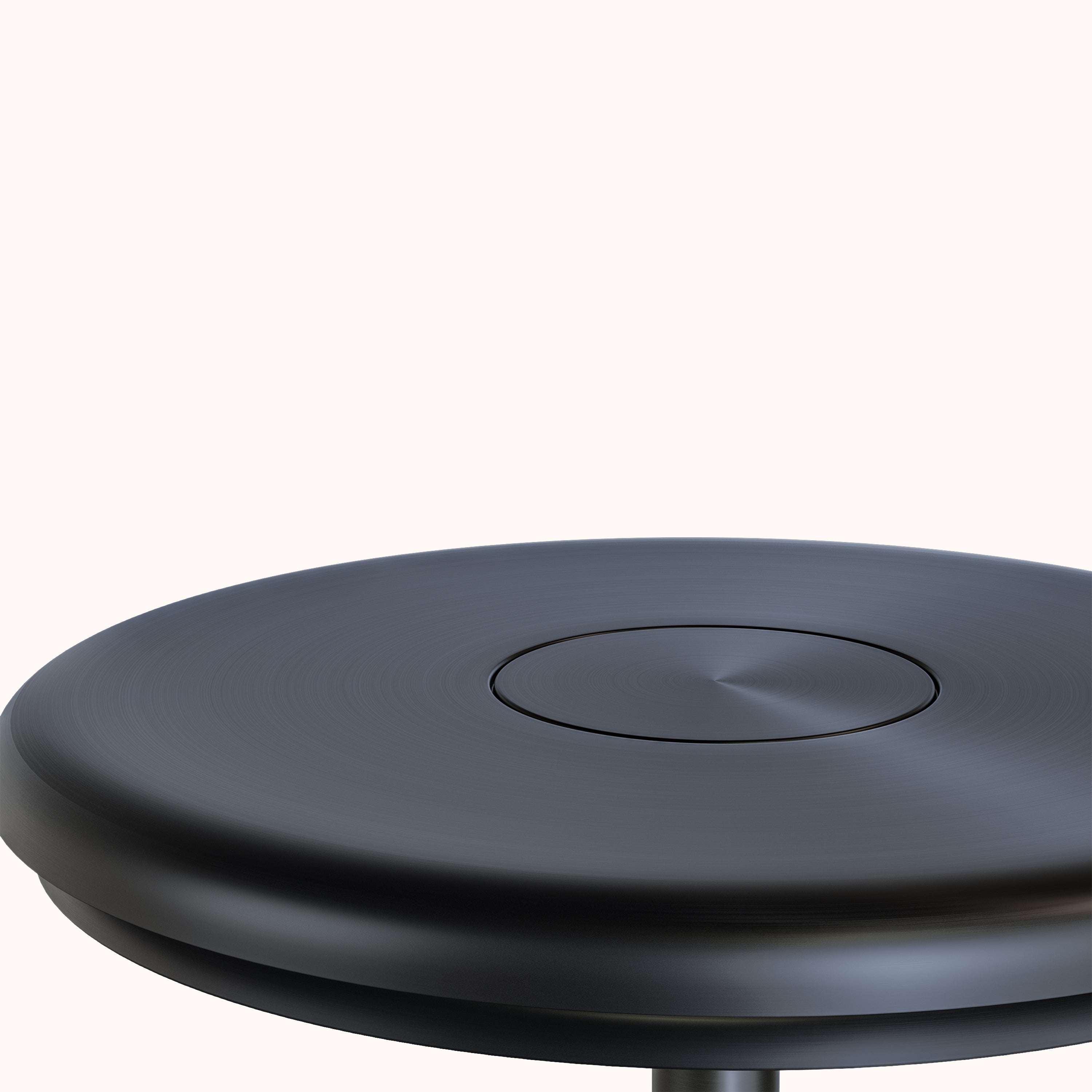 Sleek black wireless charging pad with circular design, minimalist style, and metallic finish. Ideal for fast charging smartphones and devices.