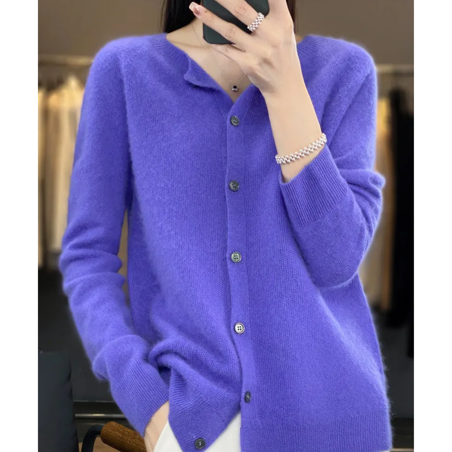 Purple cashmere cardigan with buttons, long sleeves, and round neckline, women's fashion sweater.