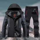 Men's black waterproof hiking jacket and pants set, outdoor winter gear, insulated, with hood.