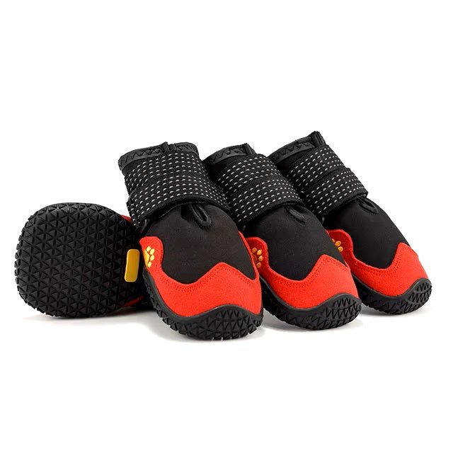 Red and black dog boots with anti-slip soles, adjustable straps, and reflective stitching for outdoor protection. Durable pet footwear for all seasons.