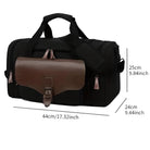 Black travel duffel bag with brown leather accents, featuring multiple compartments and adjustable shoulder strap. Dimensions: 44cm x 25cm x 24cm.