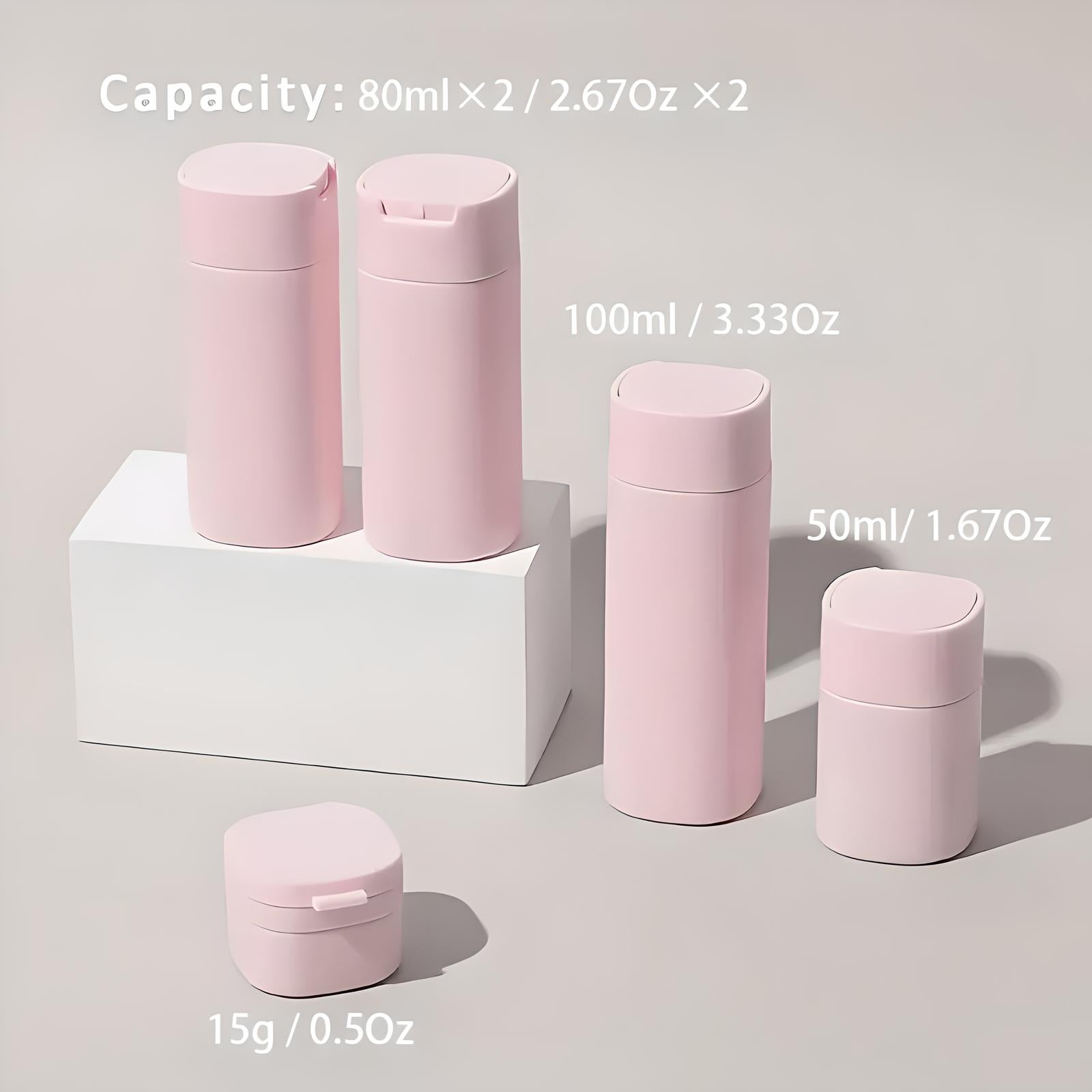 Pink travel-sized cosmetic containers set, featuring bottles and jars with capacities of 80ml, 100ml, 50ml, and 15g, ideal for skincare products.