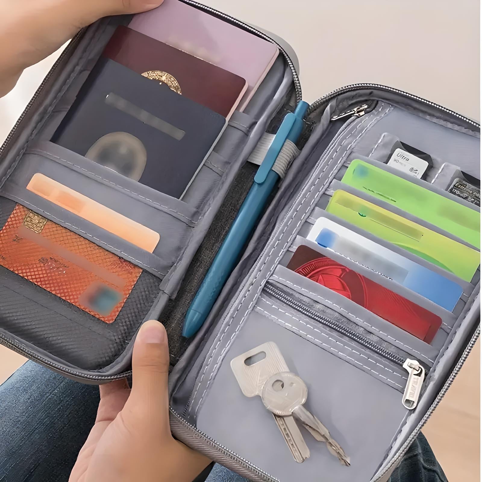 Travel wallet organizer with multiple compartments holding passports, credit cards, pen, keys, and SIM cards. Ideal for secure travel document storage.