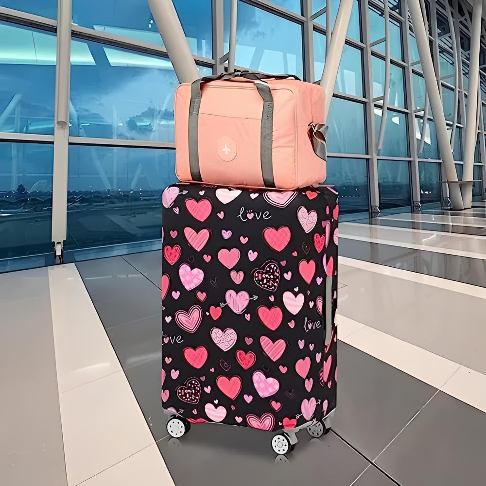 Colorful heart-patterned suitcase with pink travel bag on top, set in modern airport terminal. Travel luggage, airport, suitcase cover, travel accessories.