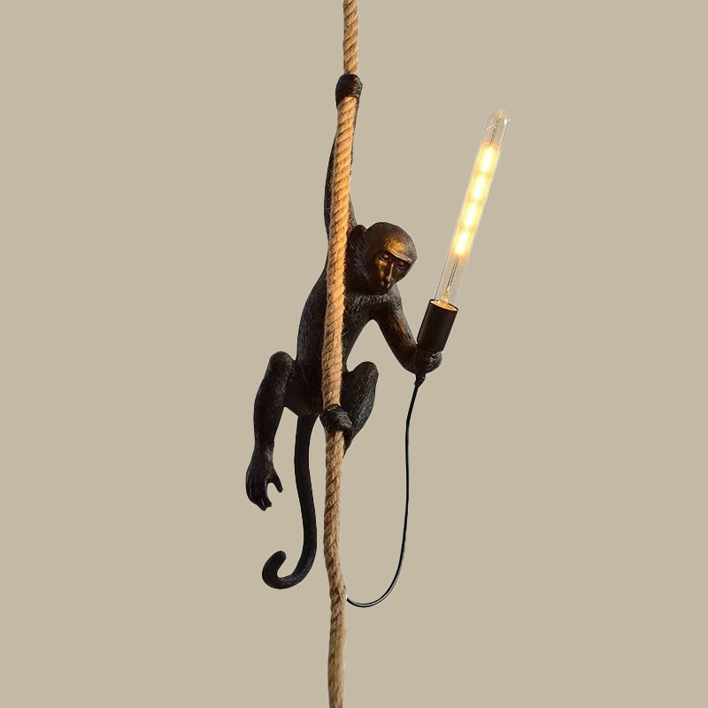 Monkey lamp climbing rope with vintage Edison bulb, unique home decor, whimsical lighting fixture, black resin monkey holding light, modern design.