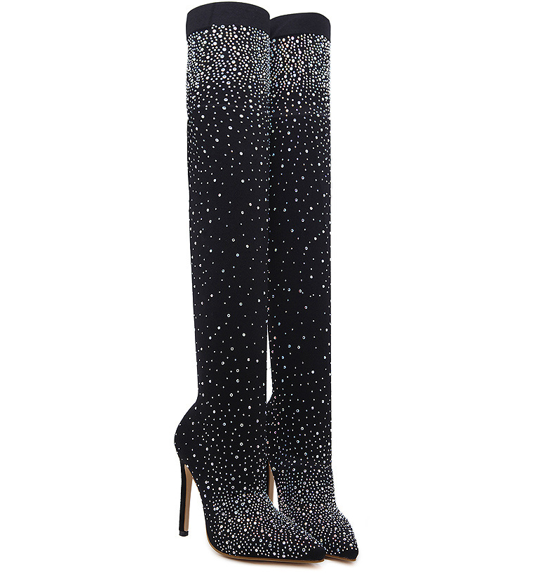 Black thigh-high stiletto boots with sparkling rhinestone embellishments, pointed toe, and sleek design. Perfect for fashion-forward, elegant style.