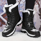 Black winter snow boots with white fur lining, durable soles, and lace-up design, perfect for cold weather. Snowy background enhances winter theme.