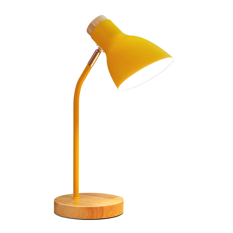 Yellow modern desk lamp with wooden base, adjustable neck, and sleek design. Perfect for home office lighting. Energy-efficient and stylish.