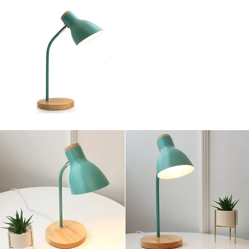 Modern green desk lamp with wooden base, adjustable neck, and minimalist design. Ideal for home office lighting and contemporary decor.