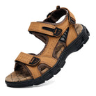 Men's brown leather hiking sandal with adjustable straps, cushioned insole, and durable black rubber sole, ideal for outdoor activities and summer wear.