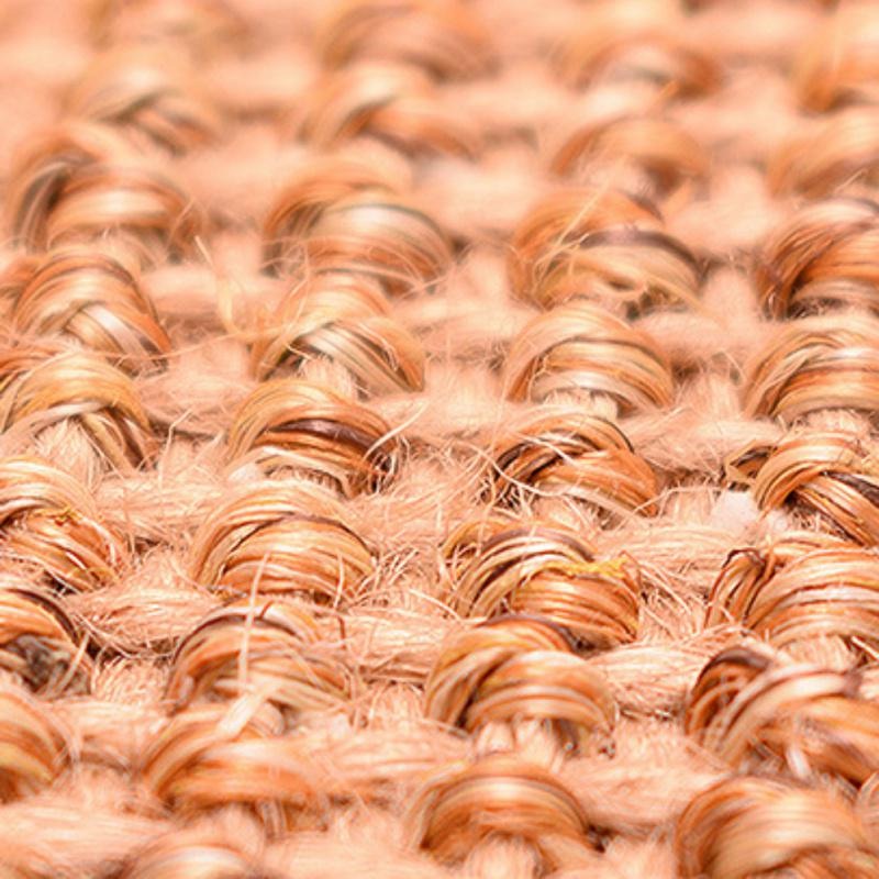 Close-up of woven jute fabric texture, showcasing natural fibers and intricate pattern. Eco-friendly, sustainable material for home decor and crafts.