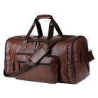 Brown leather duffel bag with multiple compartments, adjustable shoulder strap, and sturdy handles. Ideal for travel, gym, or weekend trips.