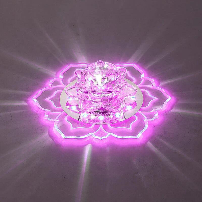 Glowing pink LED lotus flower lamp with intricate petal design, perfect for home decor, meditation spaces, and ambient lighting.